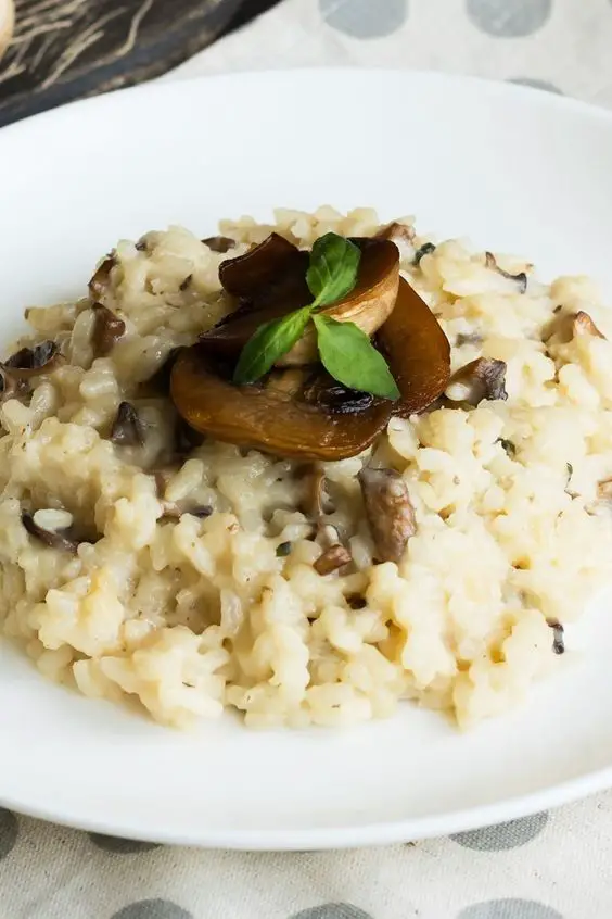 Instant Pot® Mushroom Risotto on a round white plate.