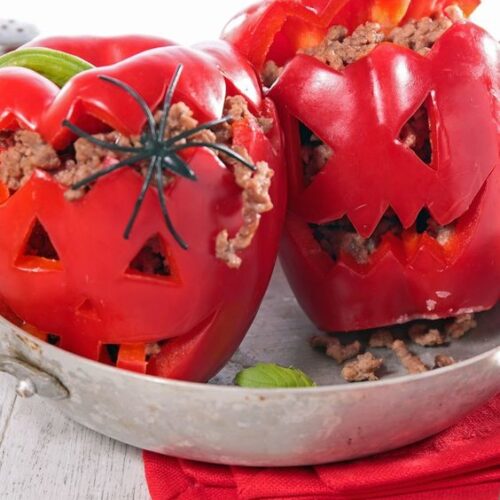 Halloween Jack-O-Lantern Stuffed Peppers - Nesting Lane Indulge