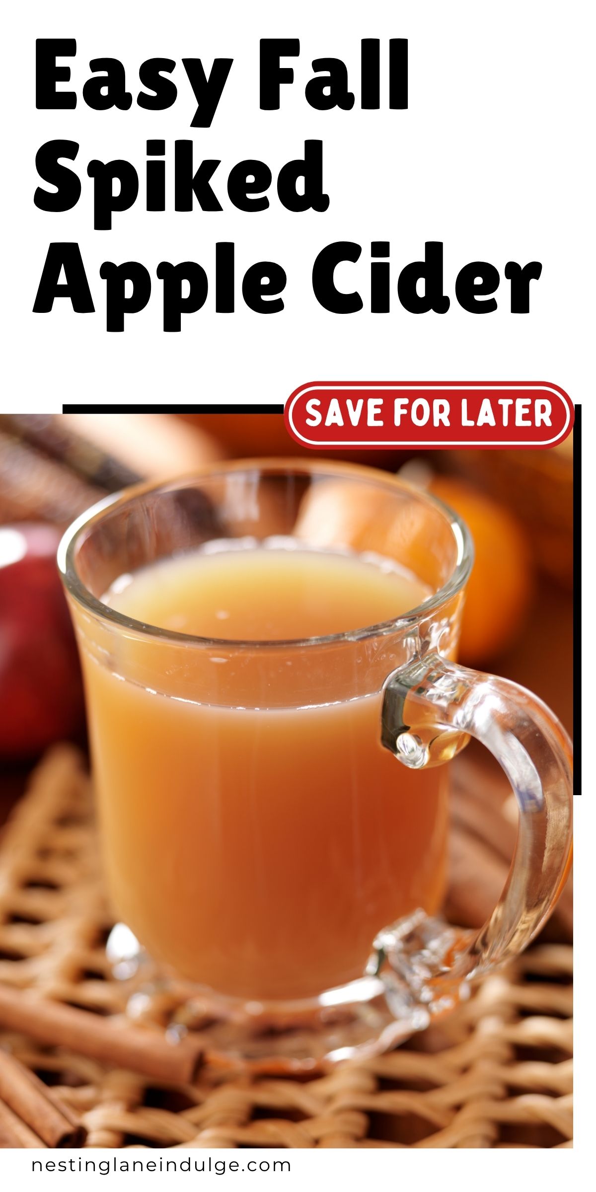 Clear glass mug of warm spiked apple cider on a woven placemat with cinnamon sticks; apples and fall decor blurred behind. Text reads &ldquo;Easy Fall Spiked Apple Cider&rdquo; with a red badge &ldquo;Save for Later.&rdquo; URL: nestinglaneindulge.com. Autumn cocktail, fall drink recipe, spiked apple cider.