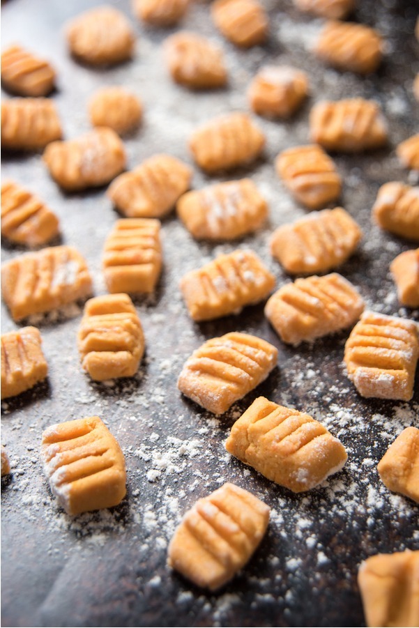 Raw Sweet Potato Gnocchi on a baking sheet