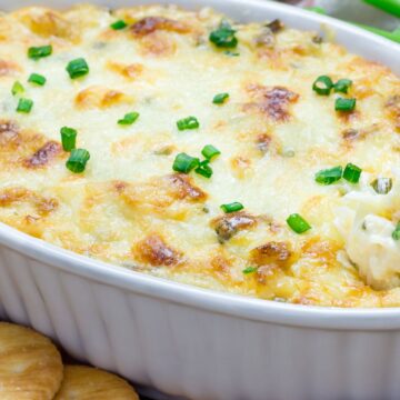 Closeup of Copycat Joe's Crab Shack Crab Dip in a white baking dish.