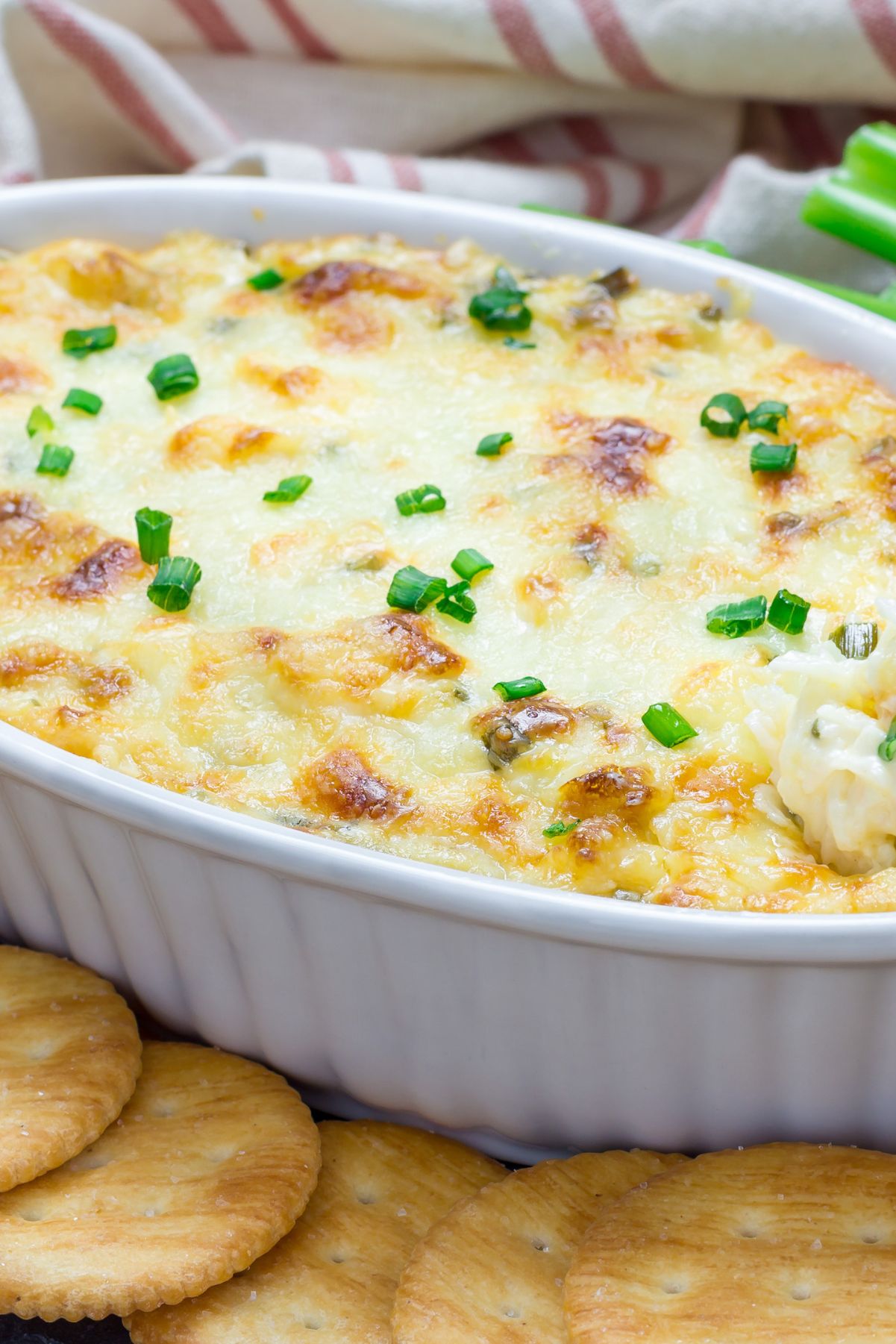 Closeup of Copycat Joe's Crab Shack Crab Dip in a white baking dish.