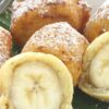 Closeup of Banana fritters in a bowl.