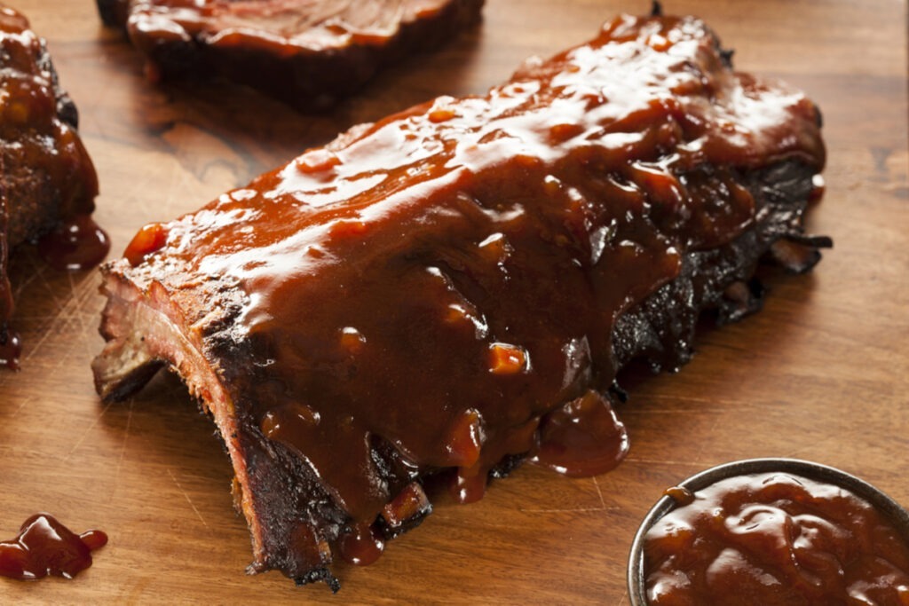 Best Grilled Barbecue Ribs on a wooden cutting board.