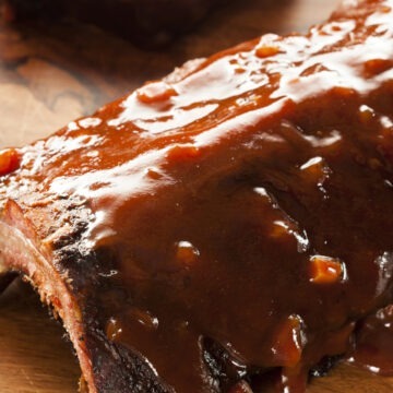 Best Grilled Barbecue Ribs on a wooden cutting board.