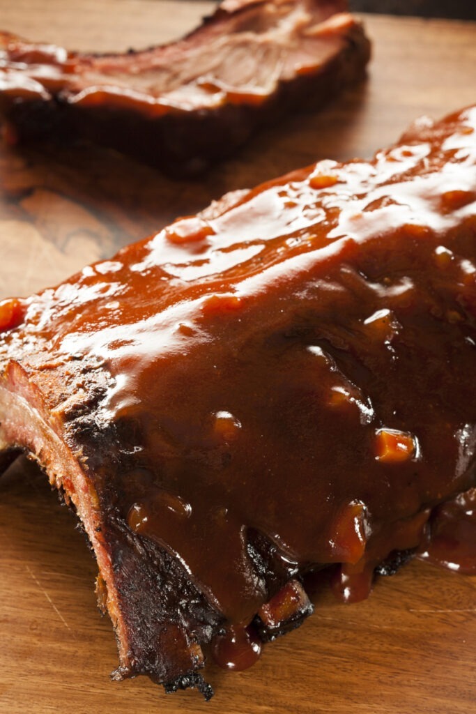 Best Grilled Barbecue Ribs on a wooden cutting board.