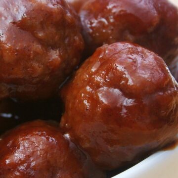 Closeup of Barbecue Meatballs (Simple and Delicious) in a white bowl.