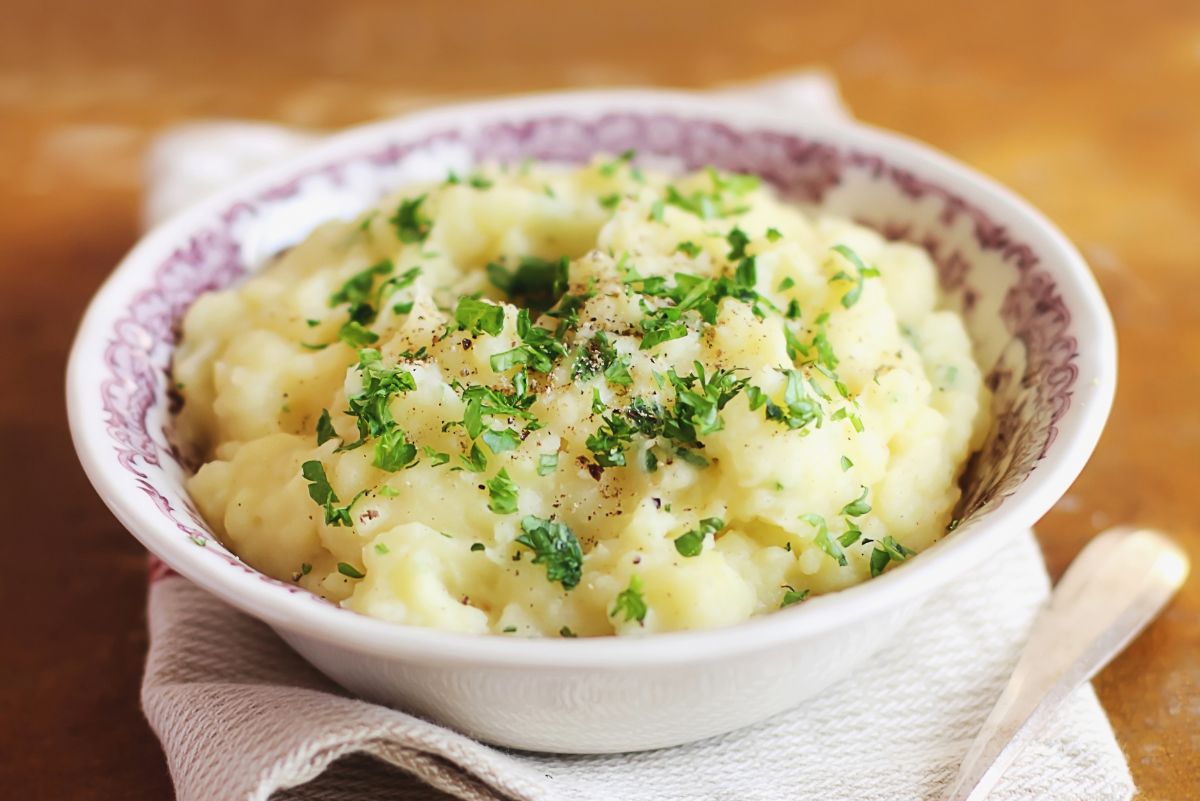 Cheesy Ranch Mashed Potatoes: in a white bowl.