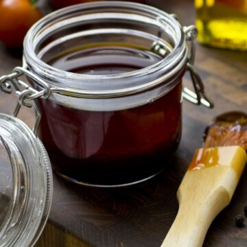Ultimate Bourbon Barbecue Sauce in a glass jar.