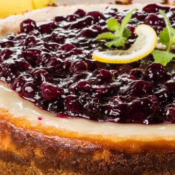 Closeup of Best Lemon Cheesecake with Blueberries.