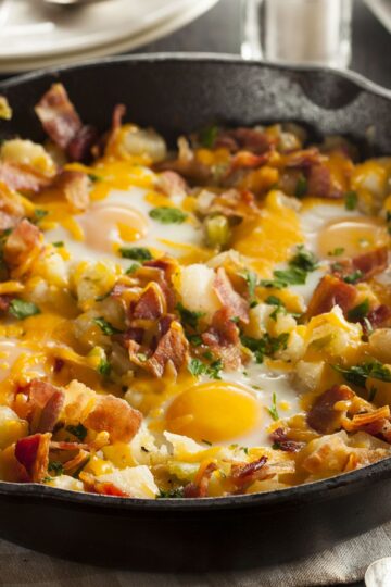Closeup of Skillet Breakfast - Egg, Bacon, and Potatoes.