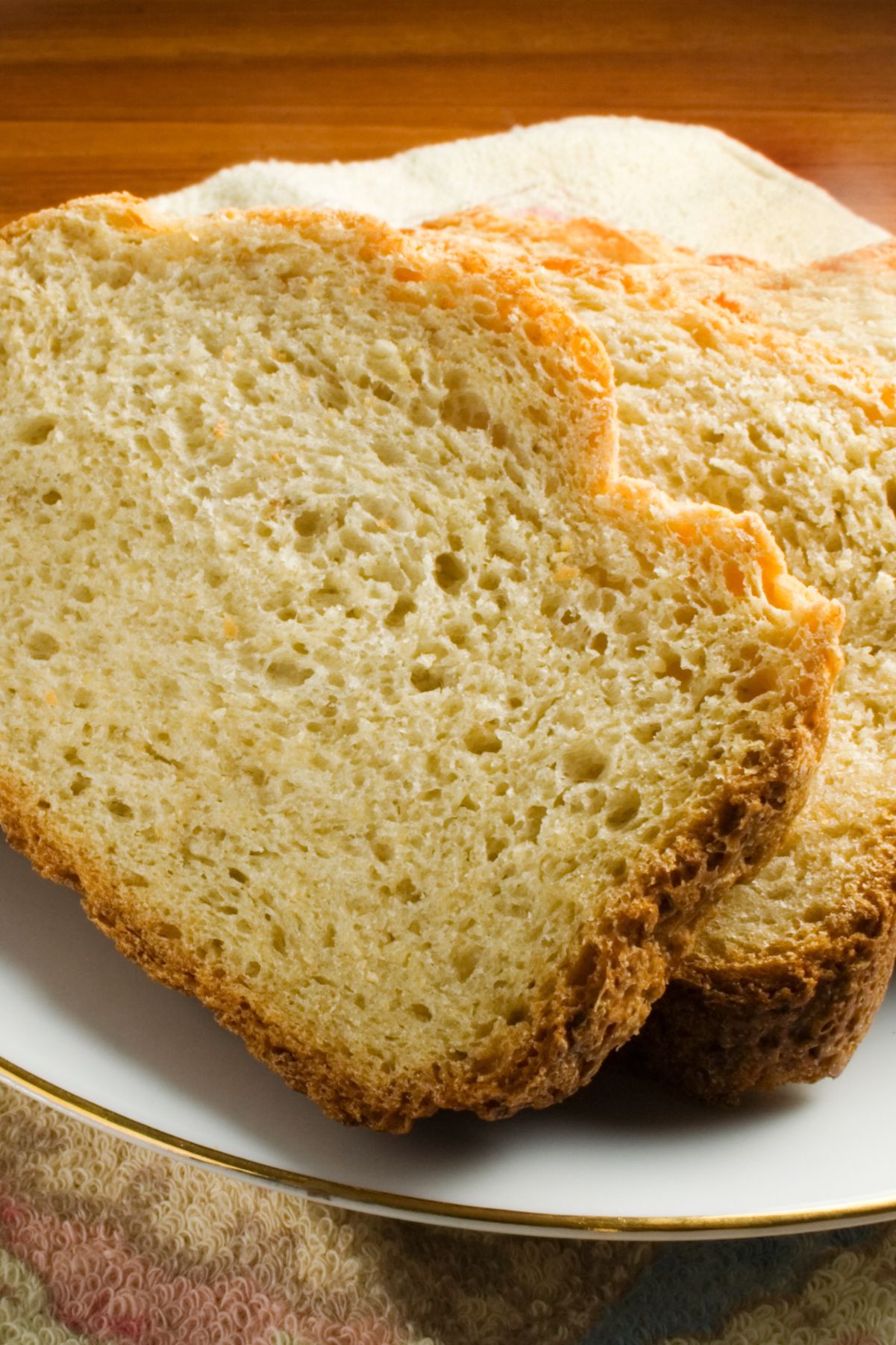 Sliced beer bread on a white plate.