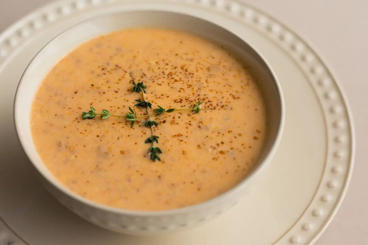 Lobster Bisque in a white bowl.