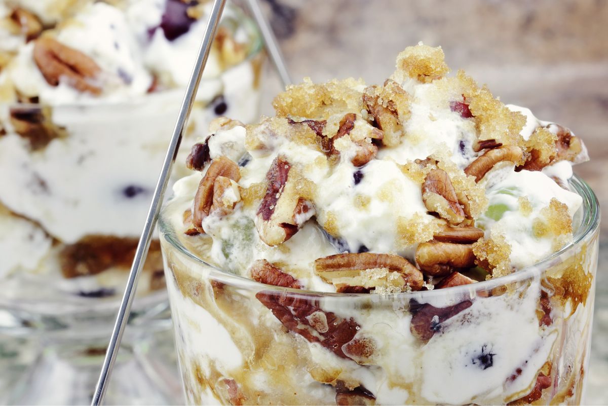 Sweet and Creamy Grape Salad in a glass bowl.