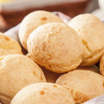 Closeup of Homemade Brazilian Cheese Bread in a basket.