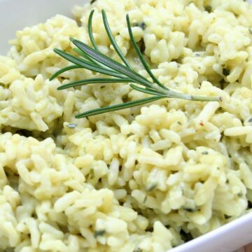 Closeup of Easy Skillet Garlic Rice in a square, white bowl.