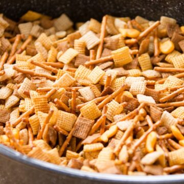 Closeup of Easy Copycat Chex Mix in a black pan.