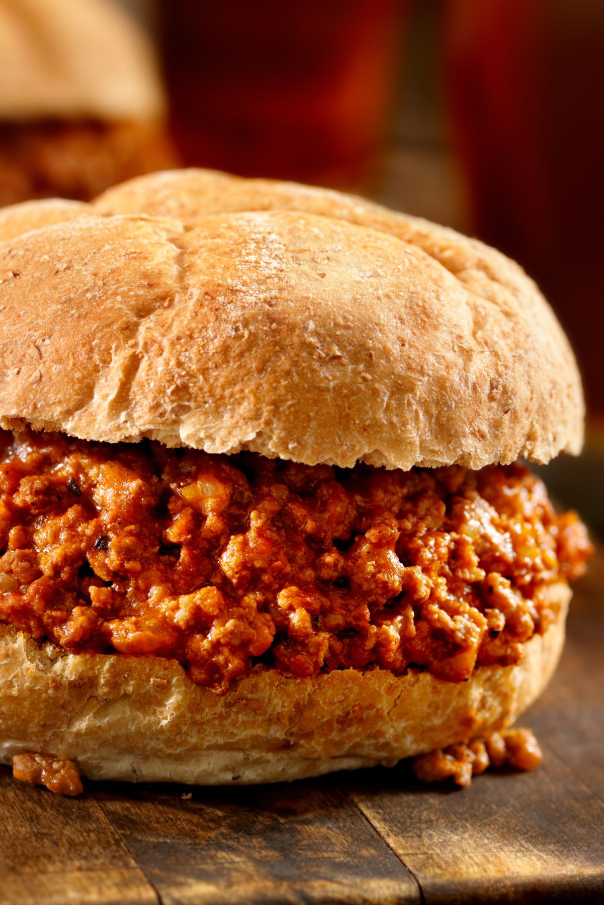 Closeup of Copycat Manwich Sloppy Joe on a dark rustic surface.