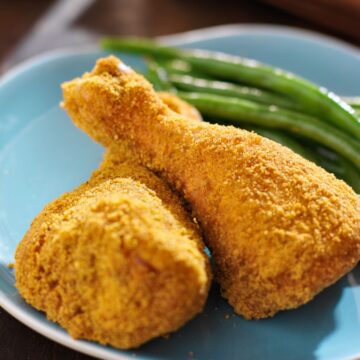 2 Chicken legs coated with Copycat Shake-n-Bake Mix.