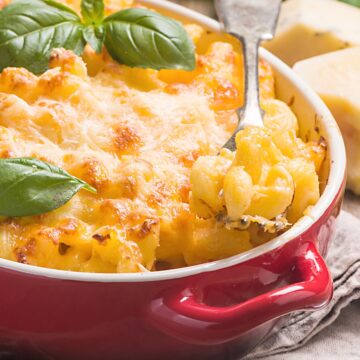 Closeup of Easy Homemade Macaroni and Cheese in a red casserole dish.