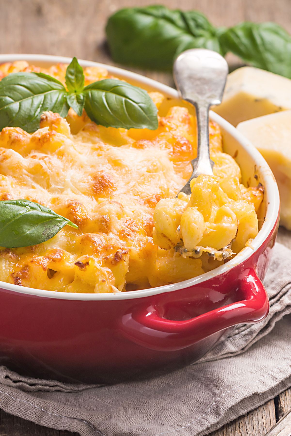 Closeup of Easy Homemade Macaroni and Cheese in a red casserole dish.
