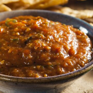 Closeup of Quick and Easy Copycat Chili's Salsa in a gray bowl.