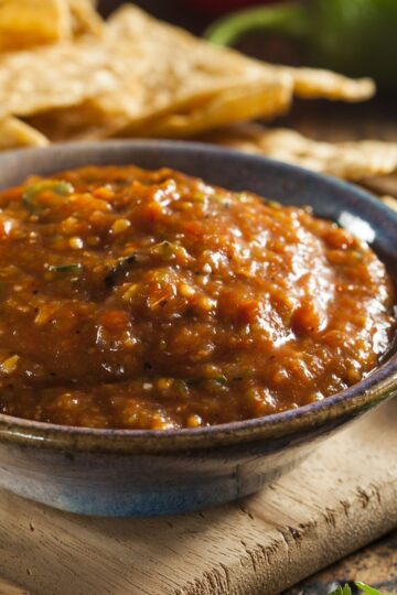 Closeup of Quick and Easy Copycat Chili's Salsa in a gray bowl.