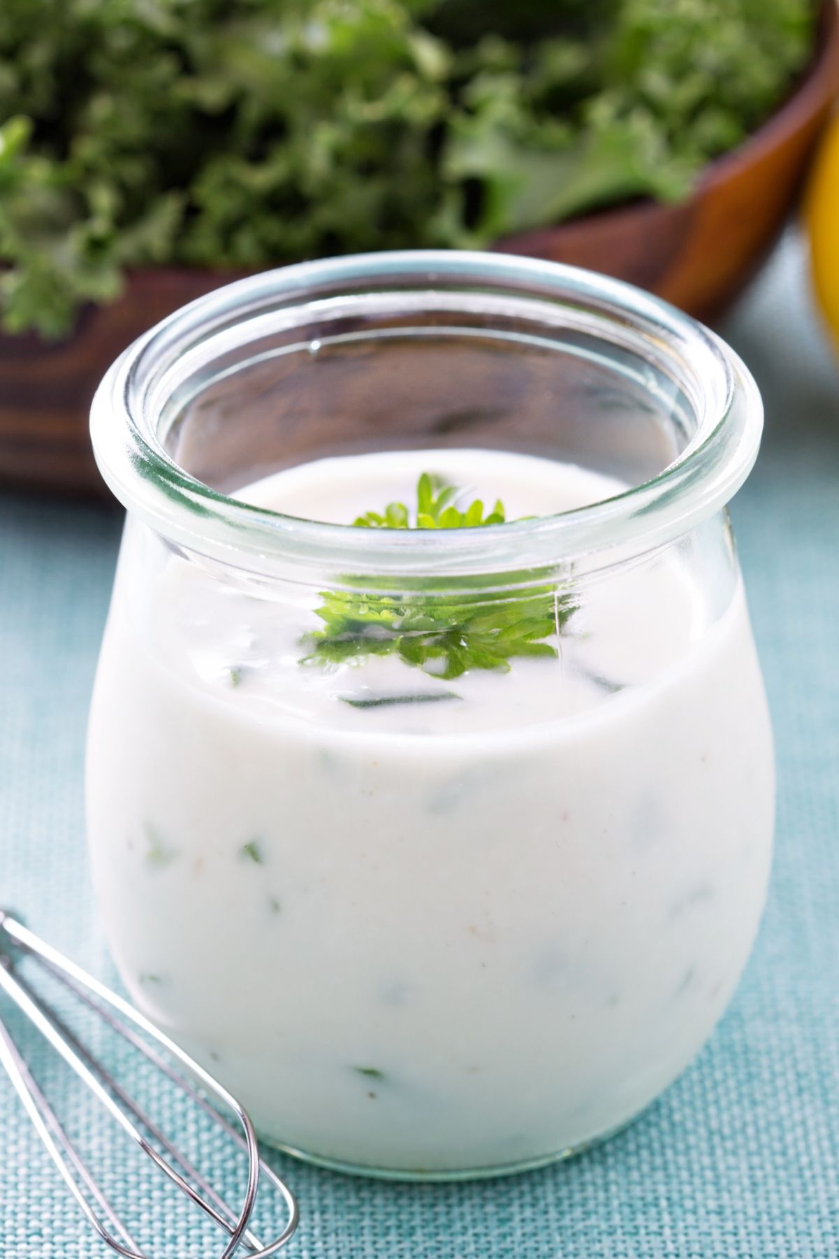 Closeup of Ranch Dressing (Copycat Outback Steakhouse) in a jar.