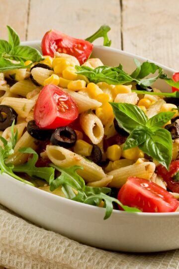 Spicy Fiesta Pasta Salad in an oval white bowl.