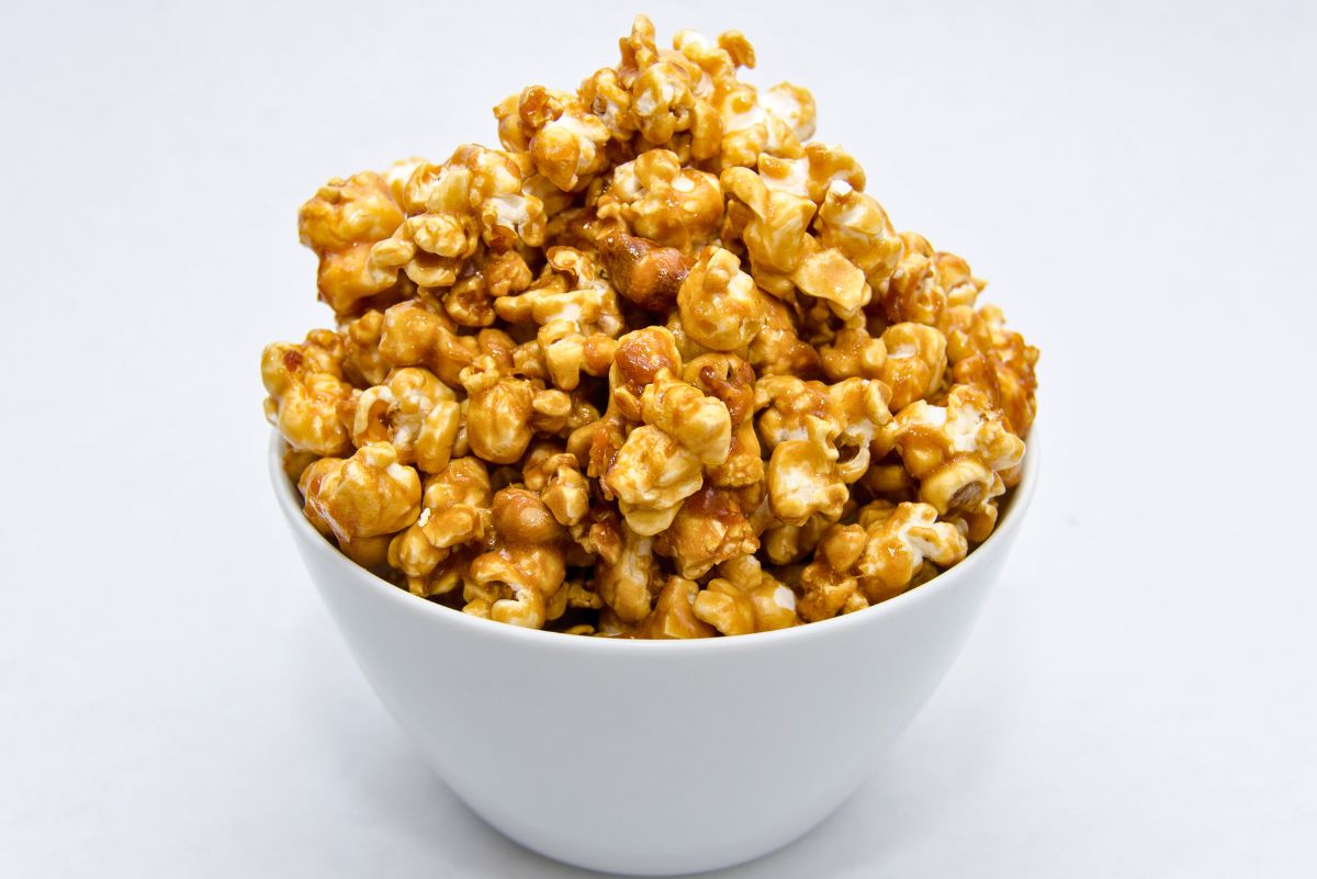 Copycat Cracker Jacks in a white bowl on a white background.