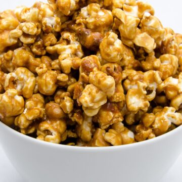 Closeup of Copycat Cracker Jacks in a white bowl.
