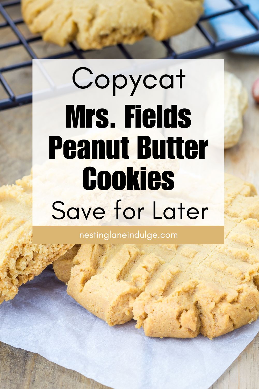 Stack of copycat Mrs. Fields peanut butter cookies with classic fork crisscross pattern, soft and thick with slightly crumbly edges on parchment paper. Text overlay reads &ldquo;Copycat Mrs. Fields Peanut Butter Cookies&rdquo; and &ldquo;Save for Later&rdquo; with nestinglaneindulge.com at the bottom.