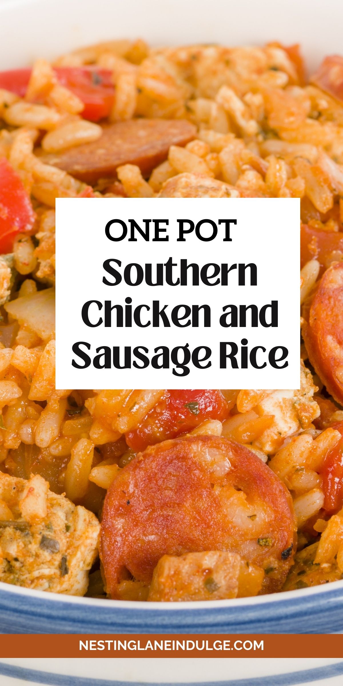 One pot Southern chicken and sausage rice in a bowl, featuring sliced smoked sausage, seasoned chicken pieces, rice, and diced tomatoes in a rich tomato sauce. Text reads &ldquo;ONE POT Southern Chicken and Sausage Rice&rdquo; and &ldquo;NESTINGLANEINDULGE.COM&rdquo; at the bottom.