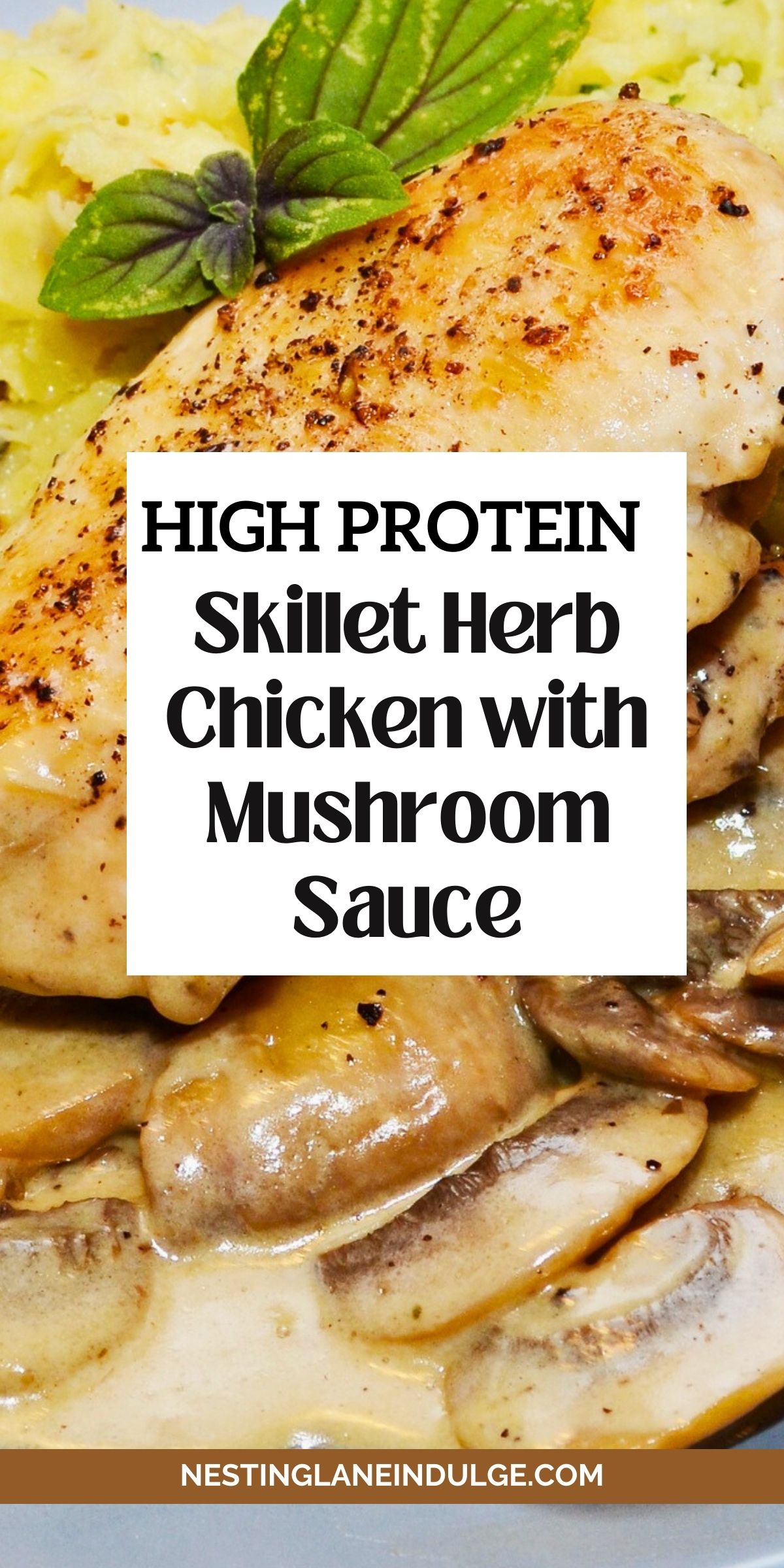 Golden brown skillet herb chicken breast topped with black pepper and fresh basil, served over creamy lemon mushroom sauce with sliced mushrooms. Mashed potatoes in the background. Text overlay reads “HIGH PROTEIN Skillet Herb Chicken with Mushroom Sauce” and “NESTINGLANEINDULGE.COM.”